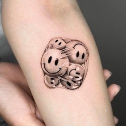 Все про тату в вигляді Смайла
