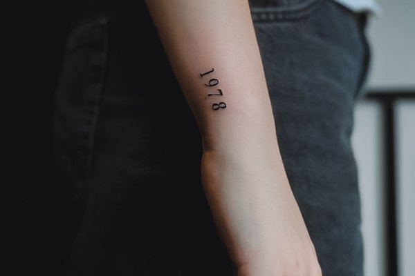 Мінімалістичне тату на передпліччі