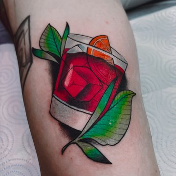 Тату склянки коктейлю з апельсином